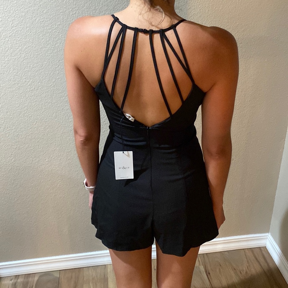 Gorgeous romper. Brand new
